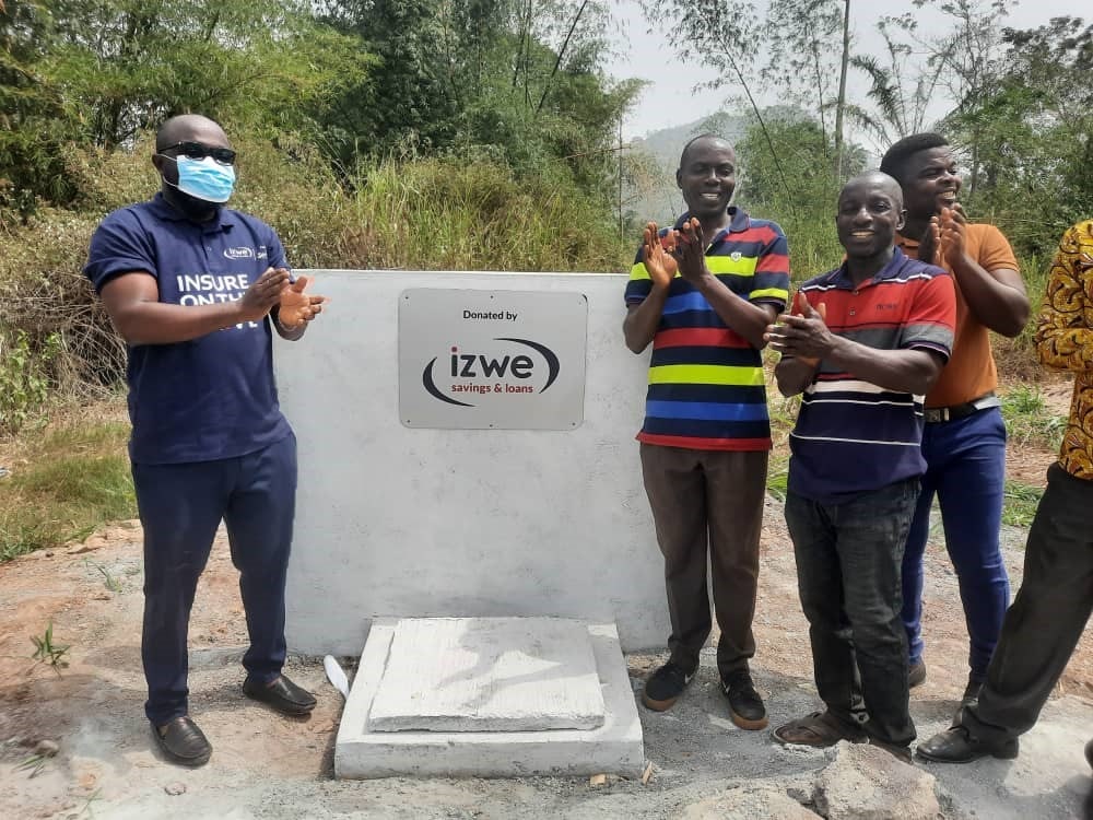 Izwe Savings & Loans builds mechanized borehole for Manya Krobo Community that relied on contaminated stream for water